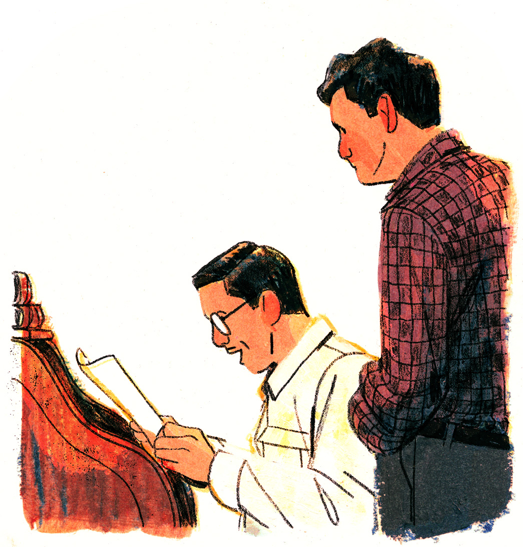 Léopold se penche vers Joseph-Armand, qui tient entre les mains une feuille de papier. Il l'écoute, l'air concentré, une main dans la poche.